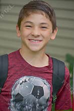 Boy with Soccer Shirt and Backpack