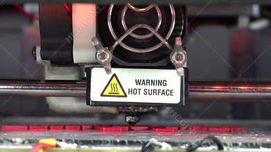 3D printer working. Fused deposition modeling, FDM. 3D printer printing an object from plastic. Automatic three