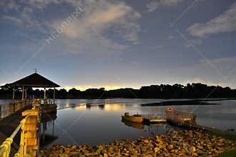 A Reservoir with calm water by night