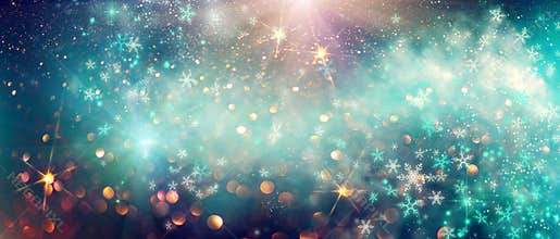 Winter Christmas and New Year glittering snow flakes swirl bokeh background, backdrop with sparkling blue stars, holiday garland