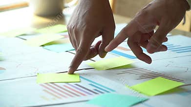 Group of business people standing meeting with colleagues in meeting room and view the annual performance graph To analyze And