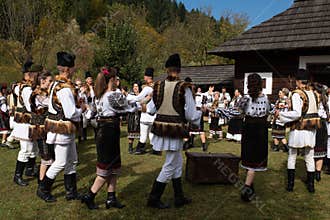Vama, Romania, September 28th, 2019, People wearing traditional play a wedding look like in Bucovina - hora