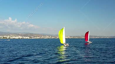 Aerial view of sailing yachts competing in the regatta at sea