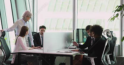 Diverse business people group working on computers in modern office