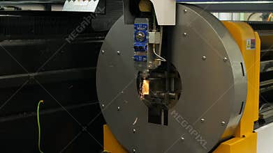 Cnc laser cutting metal automated machine in the industrial factory.