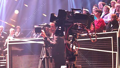 People viewers in a TV studio while recording a TV show