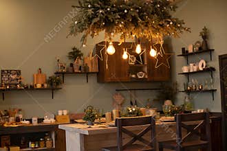 Beautifully decorated kitchen table for Christmas. Christmas and New Year.