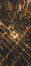 Breathtaking Portrait Aerial View of the Empire State Building at Night in Manhattan, New York City at Night