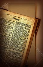 Very old Bible opened to the book of Genesis
