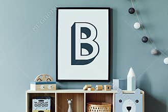 Cute interior of kid room with poster frame, baby accessories and toys.