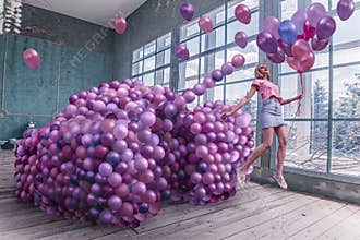 Woman with tank of balloons portrait  photoshoot