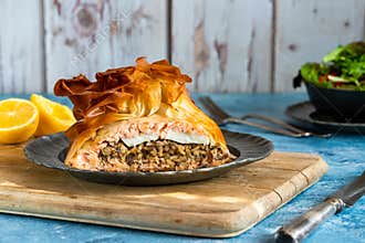 Coulibiac - salmon stuffed with rice, mushrooms,onion,dill and hard-boiled egg
