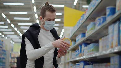 Man in medical mask at the supermarket during coronavirus pandemic