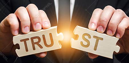 A man shares two puzzles with the word Trust. Violation of agreements and promises. Lose credibility. Failed to maintain