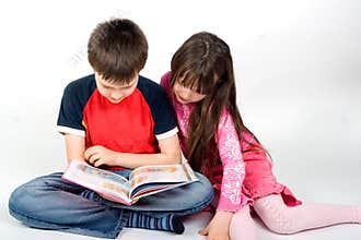 Children Reading a Book