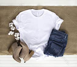 White shirt mockup - tshirt with cotton plant, burlap, boots & jeans