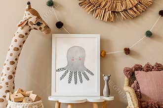 Beige playroom for kids with cute natural animal toys and poster in cosy Scandinavian style.