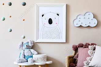 Playroom for kids with cute toys and mockup poster frame in Scandinavian style