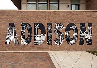 Mural by Ali Koch on an outside wall of an apartment building in Addison, Texas.