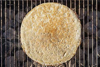 Russian pancake on white background. Russian traditional dish - bliny