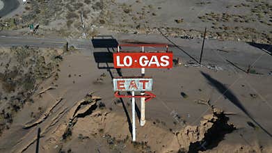 Aerial abandoned ghost town Halloran Springs signs 4K