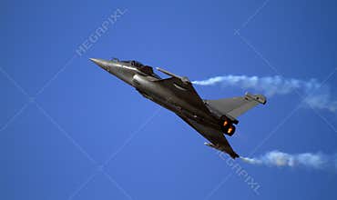 Sleek fighter zooming up into the sky