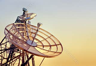 Telecommunications tower at the sunset