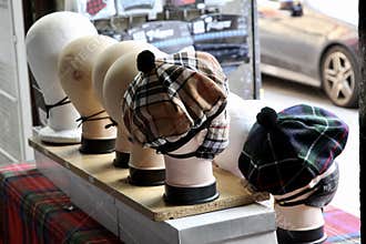 Mannequin Heads Wearing Tartan Hats and Face Masks