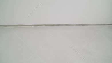 Floor leveling works. Fresh concrete floor of a construction site
