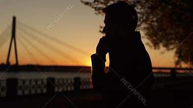 Handsome Man Answer On Phone Call .