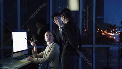 Office workers working in call center services are working overtime, discussing, brainstorming and working as a team for good serv
