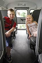 Children sitting in a school bus