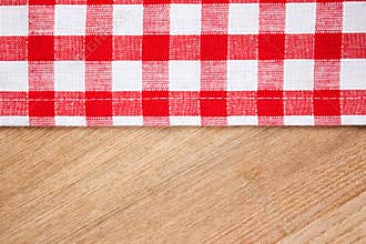 Checkered tablecloth on wooden table
