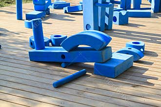 childrens playground in park with blue giant geometric figures f