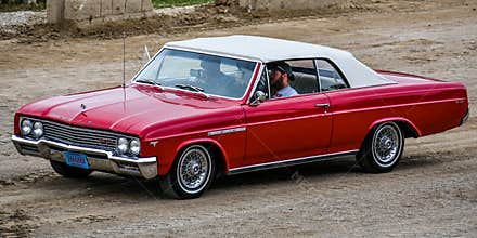 Red and White Buick Gran Sport Antique Car