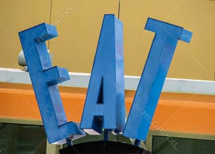 Blue Letters Signage EAT for Foodies