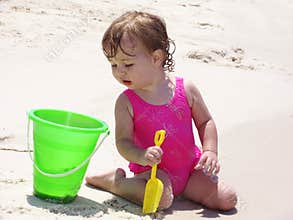 Beach Baby with bucket