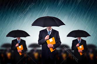 Businessmen in rain