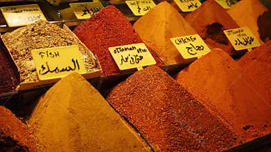 Many piles of spices in turkish traditional souk market