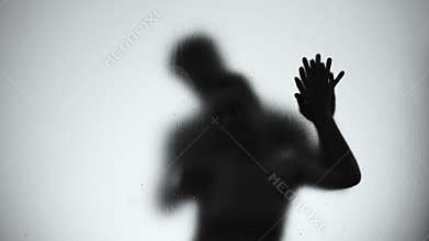 Silhouette of lovers couple hugging and kissing in shower, intimate relationship