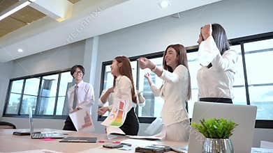 A group of business people are happy to throw the work document