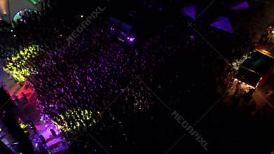 Top sky view of huge public crowd of fans at open air concert Prodigy rock star band musical perfo