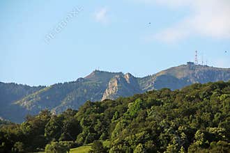 Communication relays and antennas on the mountain crest. Meteorological stations