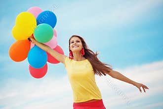 Girl with balloons
