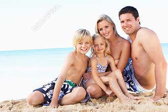 Portrait Of Family On Summer Beach Holiday
