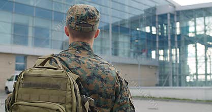 Back view of male soldier.