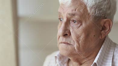 Pensive sad elder senior man looking away feel upset