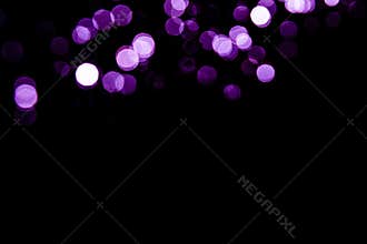 Abstract background purple bokeh with black background