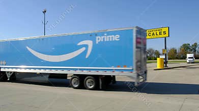 Amazon prime semi truck driving in truck stop