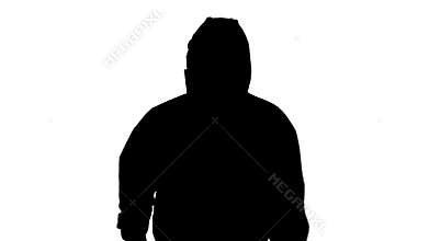 Silhouette Male doctor in protective clothes pointing to sides presenting rules for quarantine.